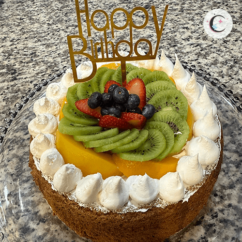 Vanilla cake, soaked in tres leches and decorated with fresh fruits and whipped cream.